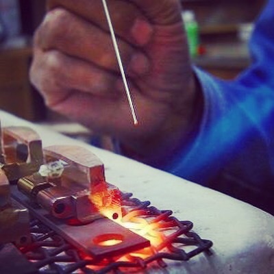 Welding and Creating original metal buckles,  Studs, Buttons and accessories for customer’s original brand.