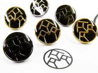 order made metal studs in gold and black and silver