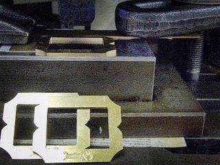オリジナルでバックル。ロゴ、社名、名入れ、デザイン、使用用途は全てオーダーメイド。